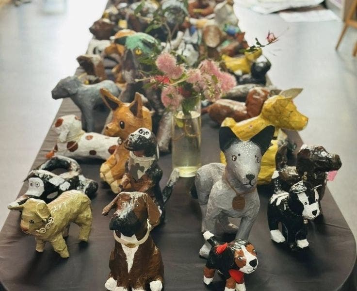 Colourful and cute paper mache dogs made by students