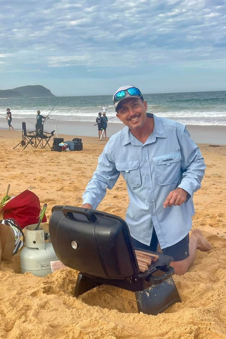 Mr Riley BBQing at the school Fishing Club Comp