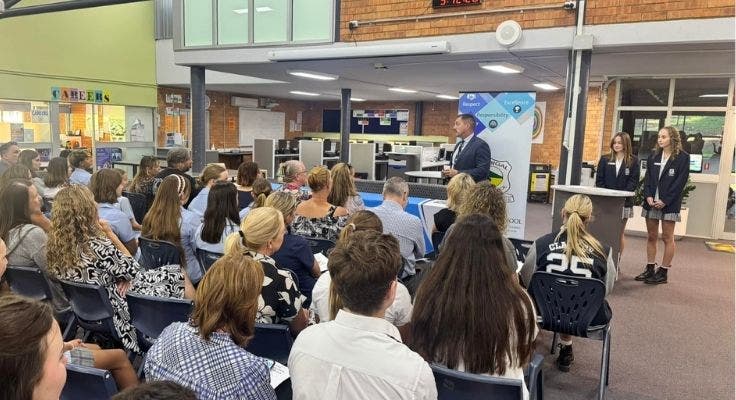Mr Riley leading a parent meeting in the Library